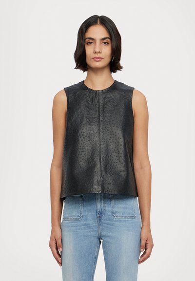Black leather sleeveless top with a textured surface and round neckline, featuring a front zipper closure and a loose, cropped fit.