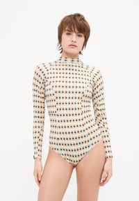 Long-sleeve swimsuit in a multicolored grid pattern, featuring shades of blue, orange, and brown, with a high neckline and fitted design.