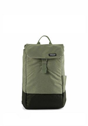 Green fabric backpack with a flap closure, adjustable straps, top handle, and a side pocket, featuring a darker bottom section.