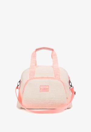 Vreča iz umetnega krzna v kremni barvi s pisanimi akcenti, z dvema zgornjima ročajema, odstranljivo naramnico in sprednjim žepom na zadrgo.