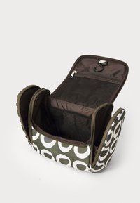 Multicolored bag with a green and white circular pattern. Features a zippered closure, spacious interior, and mesh pocket for organization.