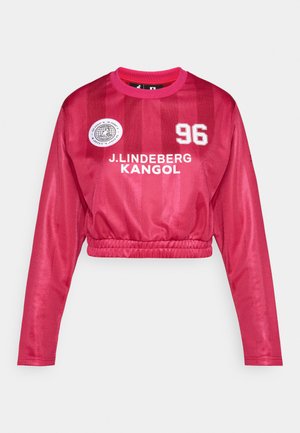 Rövidített, hosszú ujjú, élénk rózsaszín mez fényes felülettel, "J. LINDEBERG KANGOL" és számnyomott mintával, rugalmas alsó szegéllyel és sportos dizájnnal.