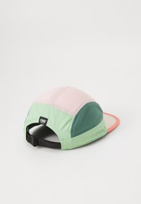 Running cap with a multi-color design featuring pink, green, and a hint of coral. Made from breathable materials with a black adjustable strap.
