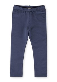 Leggings bleu marine avec une ceinture élastique, fabriqués en tissu lisse et extensible, présentant un petit logo en relief sur un côté.