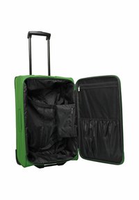 Valise souple verte avec poignée extensible, ouverte pour montrer l'intérieur noir, une poche en filet zippée et des sangles réglables.