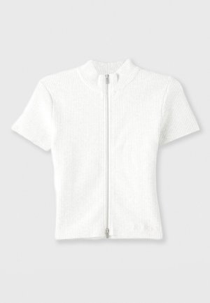 Dopasowany biały, prążkowany top z krótkim rękawem, z wysokim kołnierzem i zamek błyskawiczny z przodu. Posiada delikatną teksturę z czystym wykończeniem.