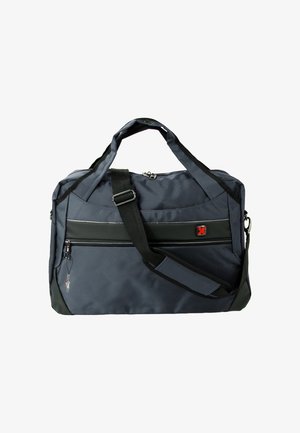 Grijze stoffen sporttas met zwarte accenten, korte handvatten, verstelbare schouderband, een voorvak met rits en een klein logo-embleem aan de zijkant.