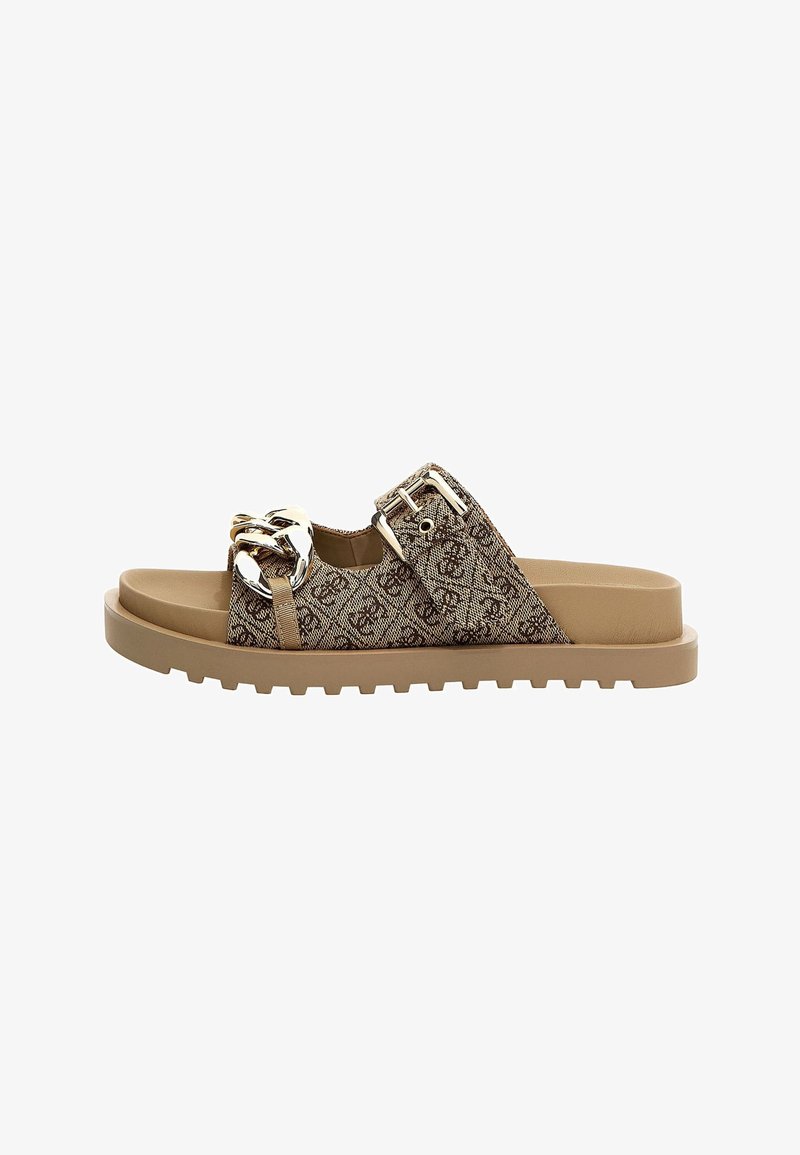Brown patterned slide sandals with a textured fabric upper, silver hardware detailing, a flat rubber sole, and adjustable buckle strap.