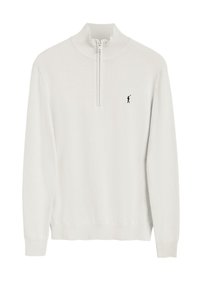 Suéter de punto en beige claro, presenta un cuello con cremallera a medio abrir, puños y dobladillo acanalados. Incluye un distintivo logo en navy de un golfista en el pecho.