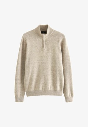 Bežinis megztinis su užtrauktuku kaklo srityje, pagamintas iš minkštos, tekstūruotos medžiagos. Gofruoti rankogaliai ir apatinė dalis. Paprastas dizainas, tinkamas kasdieniam dėvėjimui.