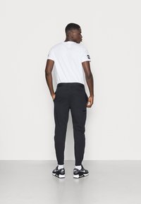 Jordan WARMUP PANT - Treningo apatinė dalis - black