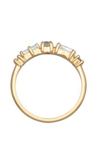 Goldring mit fünf unterschiedlich geformten Steinen: zwei hellblaue, ein grauer, ein klarer und ein lila Akzent, gefasst mit erhöhten Krappen.