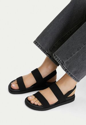 Jenny, Páskové sandály - black