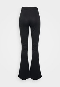 Pieces PCOTINE FLARED PANTS - Calças - black