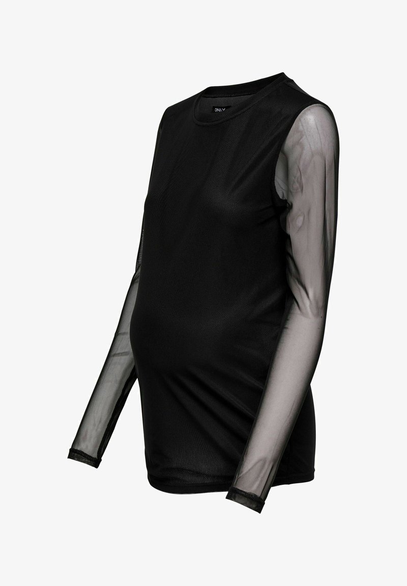 Melna grūtnieču garām piedurknēm piestāvīga blūze ar caurspīdīgām sietiņa piedurknēm. Iezīmē apaļu kakla izgriezumu un teksturētu audumu visā virsmas platībā.