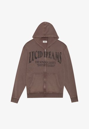 Moletom castanho com fecho éclair, possui um bolso canguru à frente e a impressão em preto "LUCID DREAMS" na parte da frente. Apresenta um capuz forrado e punhos canelados.