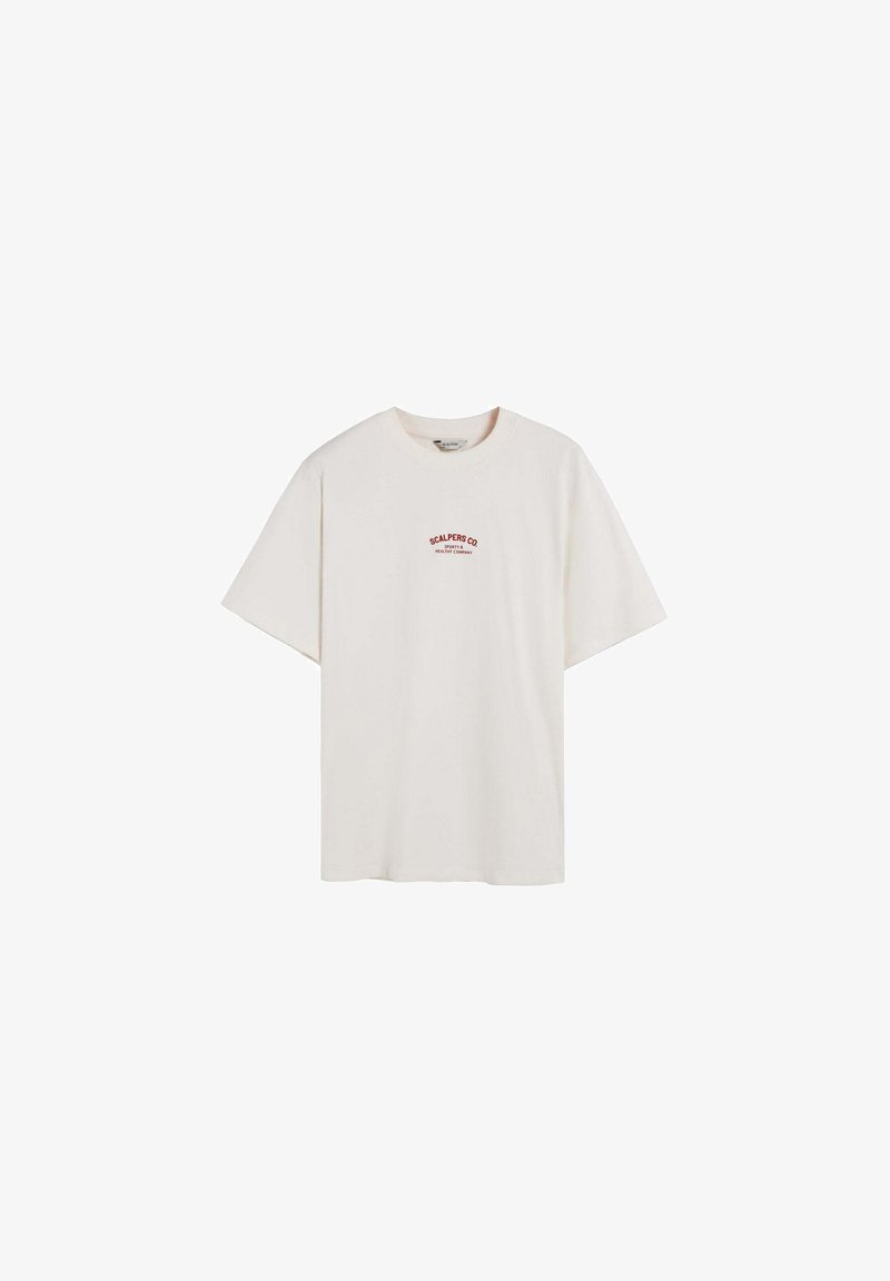 Tricou crem cu mânecă scurtă, fabricat din bumbac. Prezintă un mic logo roșu pe piept, croială lejeră și decolteu rotund.