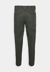 Dark green pants with a fitted design, made of a textured fabric. Features back pockets and a button closure at the waist.
