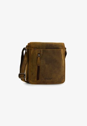 Brown leather messenger bag with a textured finish, featuring a zippered front pocket and adjustable strap. Brand logo visible on front.
