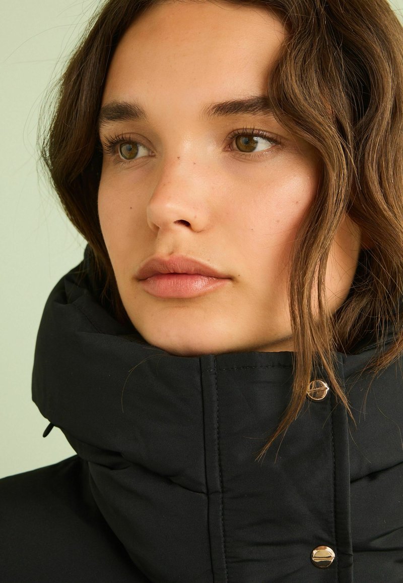 Next STANDARD - Talvitakki - black
