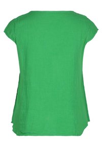 Vue arrière d'un chemisier vert vif à manches courtes, coupe ample et texture subtile.