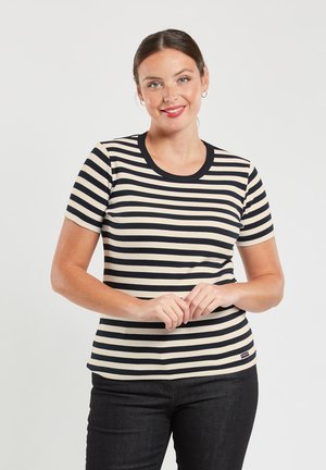T-shirt à rayures à manches courtes en beige et bleu marine, avec un col rond et une coupe ajustée. Texture côtelée, logo sur l'ourlet inférieur.