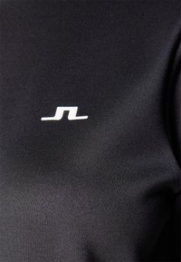 J.LINDEBERG Sports AERIAL FULL ZIP - Športna jakna/jopica - black