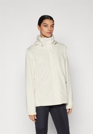 Lightweight, cream-colored jacket with a high collar, front zipper, and adjustable hood, featuring side pockets and minimal branding.