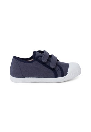 Chaussure en toile marine avec embout en caoutchouc blanc, dotée de deux bandes Velcro réglables et de panneaux latéraux texturés pour une adhérence et un confort accrus.