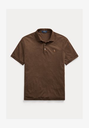 Ruda medvilnės polo marškinėliai su klasikiniu apykakle, trims mygtukais ir mažuoju siuvinėtu logotipu ant kairiojo krūtinės. Trumpi rankovės.