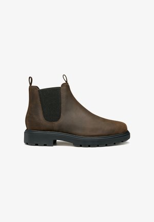 Braune Leder-Chelsea-Stiefel mit elastischen Seitenpanelen, einer Zuglasche und einer schwarzen Gummisohle mit strukturiertem Griff für besseren Halt.