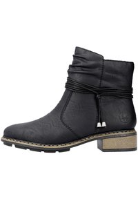 Bottes noires en cuir à la cheville avec un design flou, un talon structuré, un laçage décoratif et une semelle texturée contrastante.