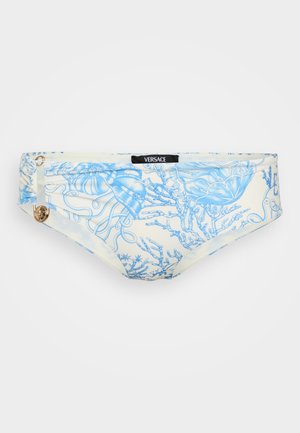 Bas de bikini Versace en tissu crème clair orné de motifs complexes de méduses bleues et de coraux ; accent en matériel logo doré.