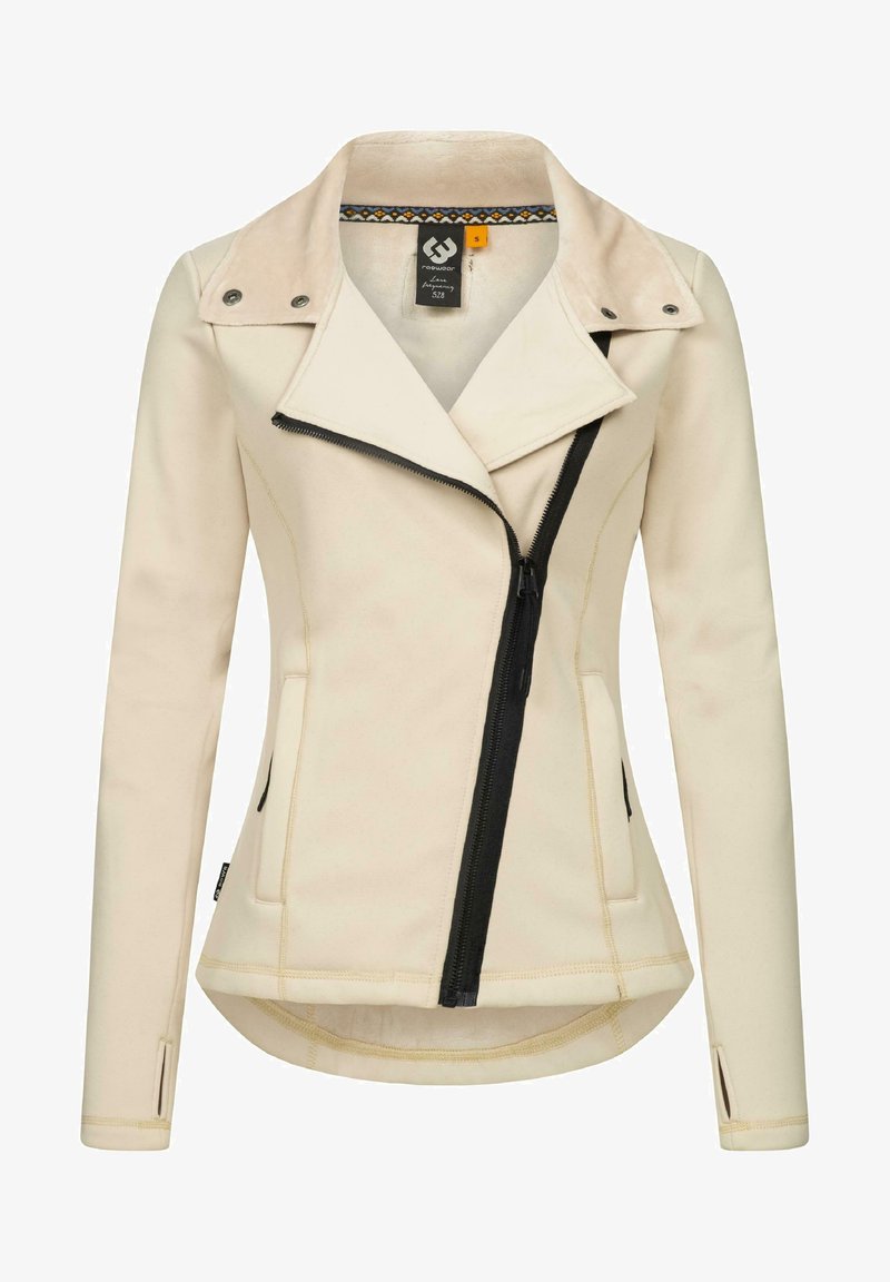 Giacca aderente beige con zip nera asimmetrica, texture liscia, orlo arrotondato e cuciture a contrasto. Presenta un colletto e tasche laterali.