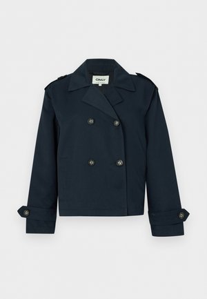 Πλεκτό σακάκι ναυτικού μπλε χρώματος, κοντό, διπλής σειράς με φαρδιές πέτσες, μανσέτες με κουμπιά και επιθεματάκια στους ώμους.