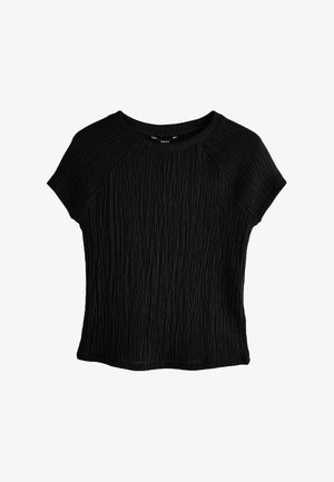 Juodas tekstūrizuotas trumpomis rankovėmis viršus su briaunotu dizainu, turintis apvalų iškirpimą ir laisvą siluetą. Pagamintas iš lengvos medžiagos.