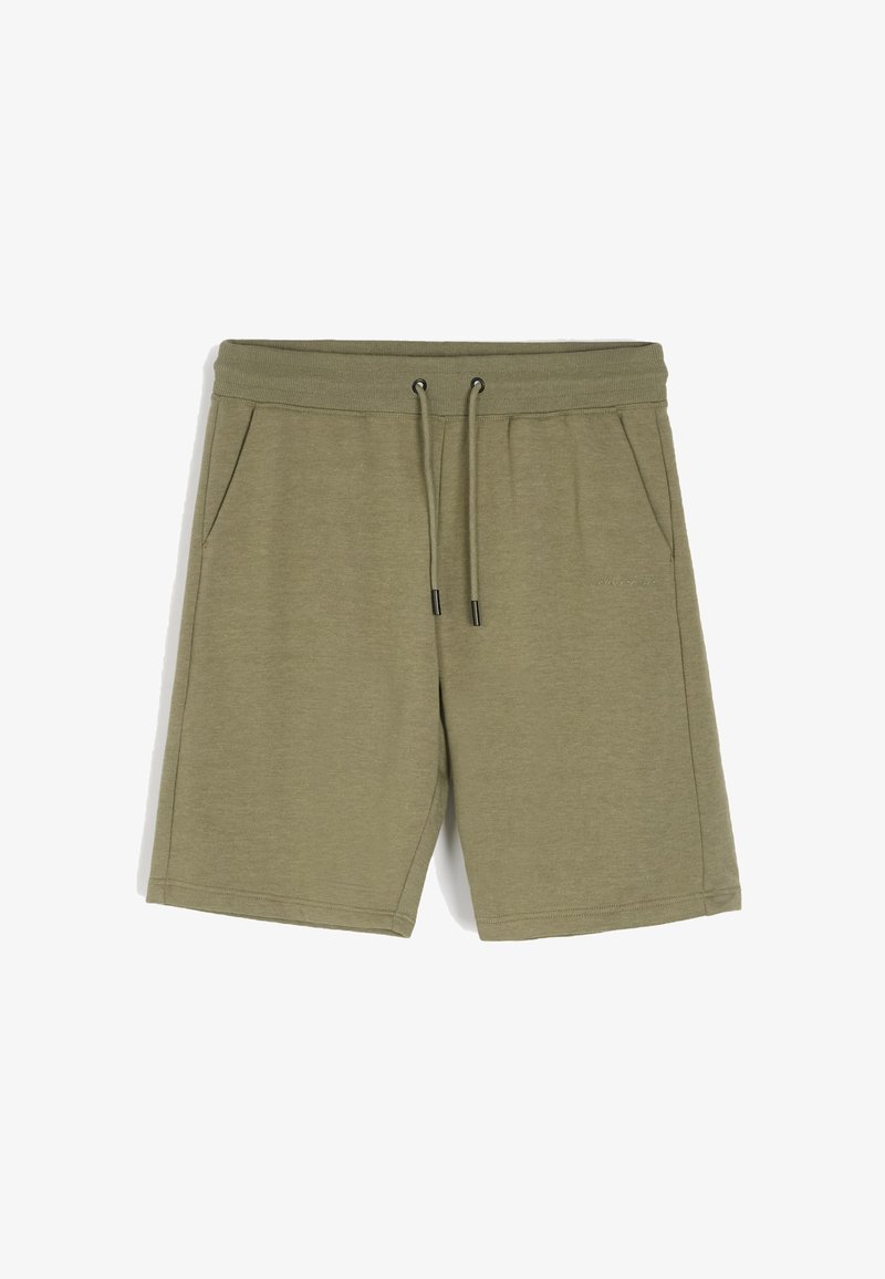 Olive zielone spodenki sportowe wykonane z miękkiego materiału, z elastycznym pasem i sznurkiem do regulacji, oraz dwiema bocznymi kieszeniami.