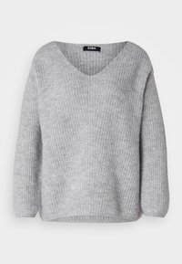 Grå stickad tröja med V-hals, vida ärmar och ribbat mönster. Har en avslappnad passform och är midjelång för komfort.