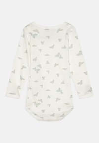 Bodysuit s dlhým rukávom v bielej bavlne s jemným zeleným zvieracím vzorom, s okrúhlym výstrihom a patentkami v spodnej časti.