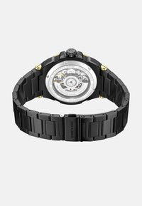 Czarny zegarek ze stali nierdzewnej z wzorzystą bransoletą, przezroczysty tył odsłaniający mechanizm, złote akcenty na koronce i łącznikach, wodoszczelność 5 ATM.