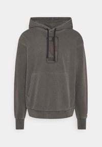 Grauer Pullover-Hoodie mit einer vorderen Tasche, verstellbarem schwarzen Kordelzug und einem dezenten Logodetail. Weicher Stoff mit lockerer Passform.