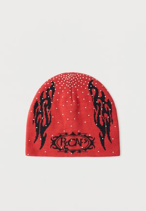 Red knit beanie with black flame patterns on sides, white dot accents, and black stylized "RCNF" logo on front center.