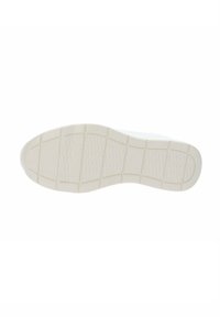 Suola di sneaker in gomma bianca con un motivo testurizzato e sezioni rialzate per una presa migliore; design flessibile, con una finitura liscia e senza brandizzazioni visibili.