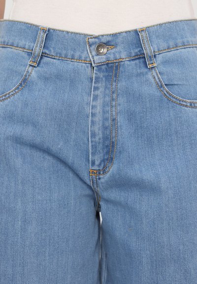 Light blue denim jeans with a zip fly and a button closure. Features five pockets and contrast stitching along the seams.