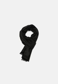 Black scarf made from soft fabric, featuring a subtle pattern, with fringed edges. It is wrapped in a circular shape.