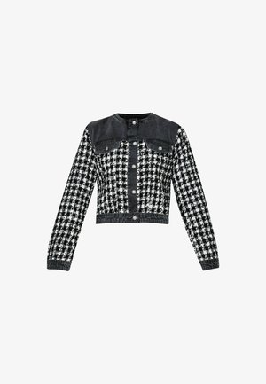 Giacca corta con parte superiore in denim nero e motivo a scacchi bianco e nero. Presenta bottoni a pressione e due tasche frontali.