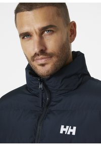 Helly Hansen YU 23 REVERSIBLE PUFFER - Chaqueta de invierno - navy