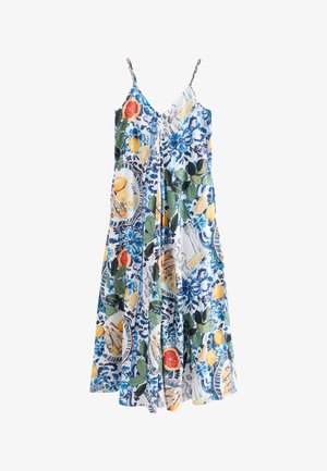 Mouwloze maxi-jurk met spaghettibandjes, uitgevoerd met een blauw bloemmotief en citrusvruchten op een witte achtergrond.