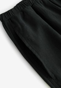 WIDE LEG - Püksid - black