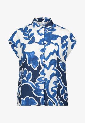 Blouse à manches courtes avec col, blanche à motif floral bleu. Tissu léger avec fermeture par boutons et coupe décontractée.
